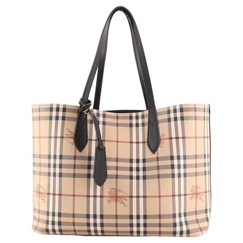 BURBERRY Coated Canvas Medium Reversible .